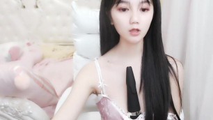 Asian doll teases her hipples in lingerie